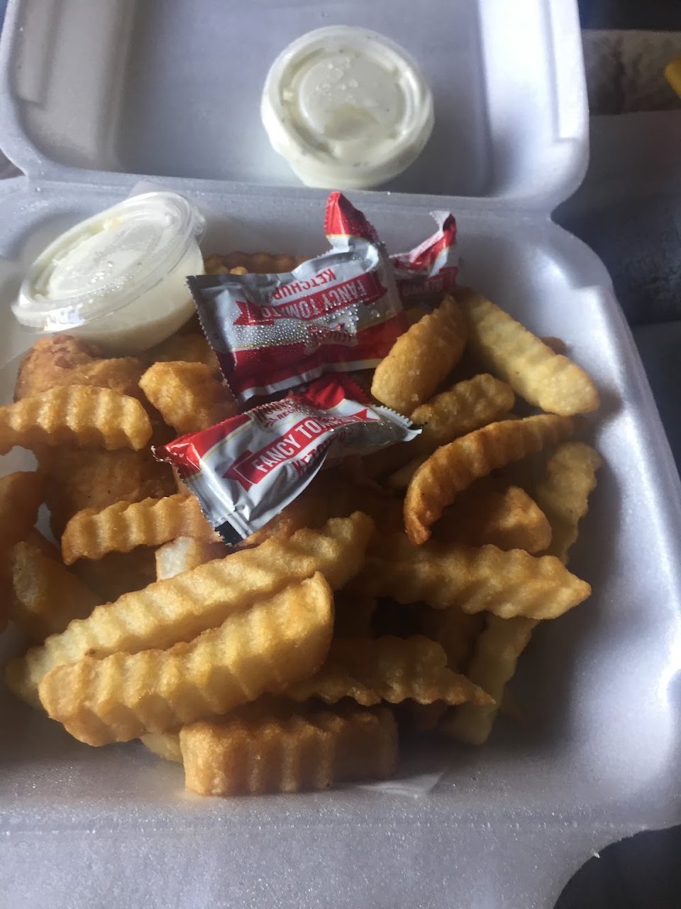 Food menu laid out on a counter.